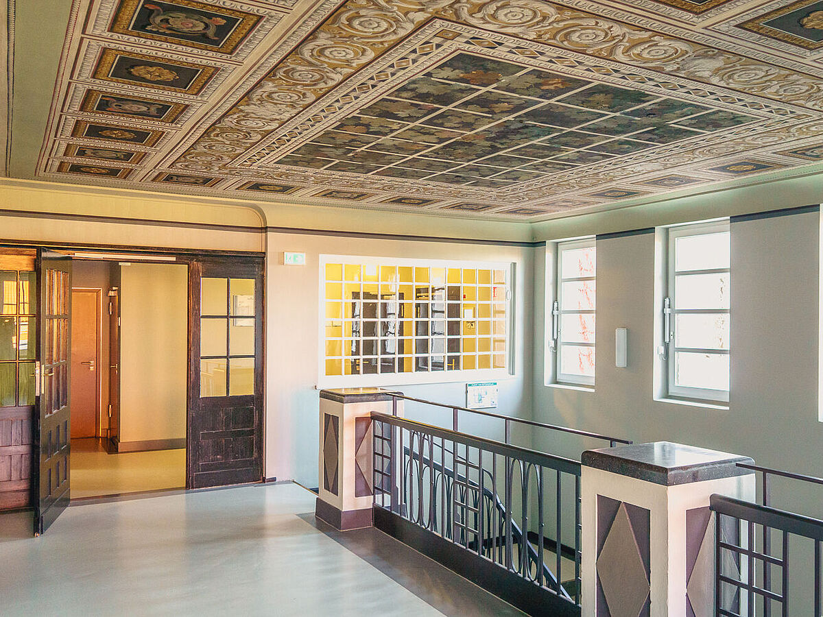 The top floor of the Department of History with its beautifully decorated ceiling.